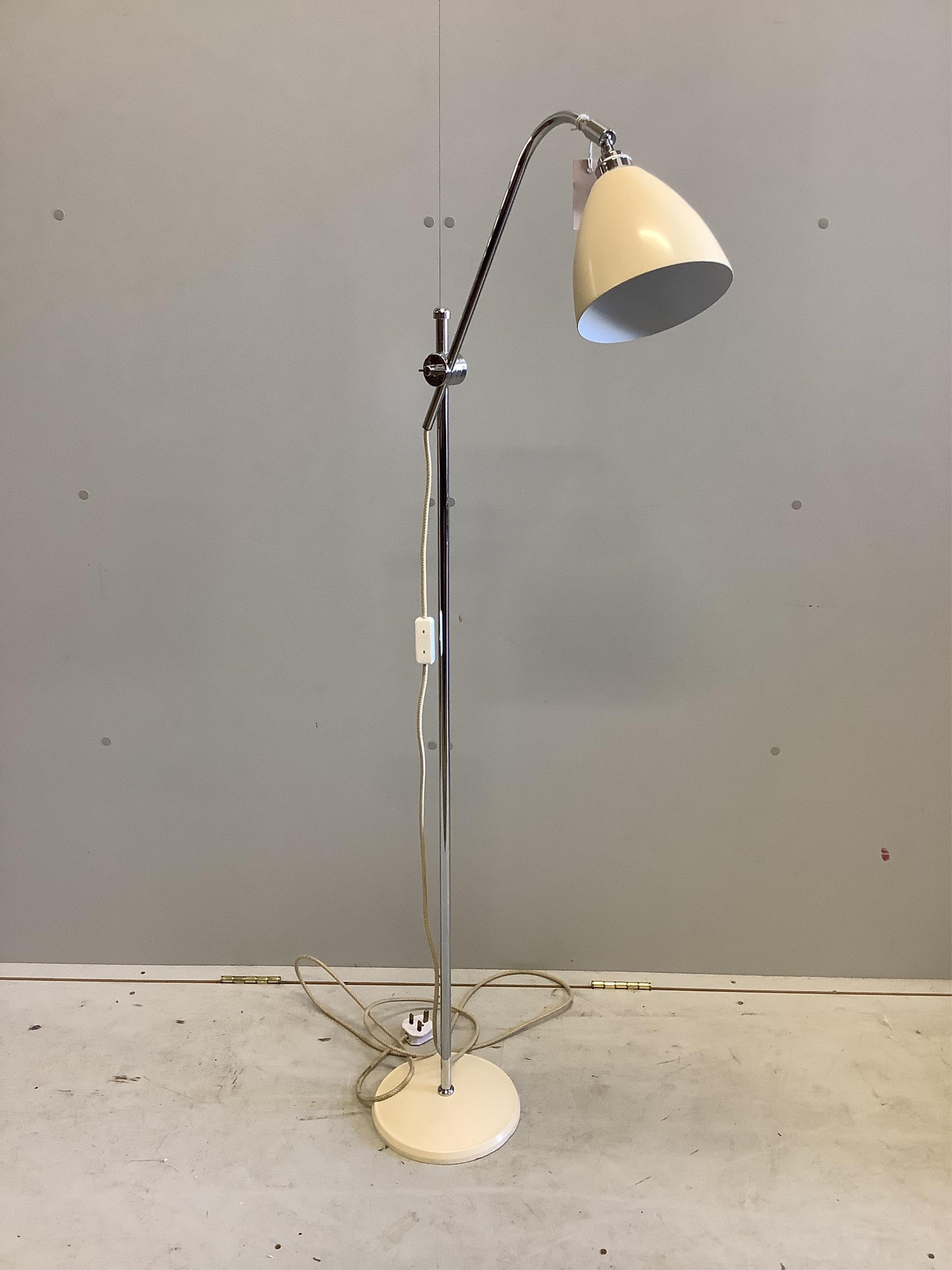 A Contemporary adjustable floor lamp, height 143cm. Condition - good